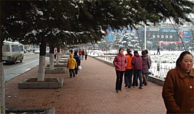 Passers-by on the sidewalk