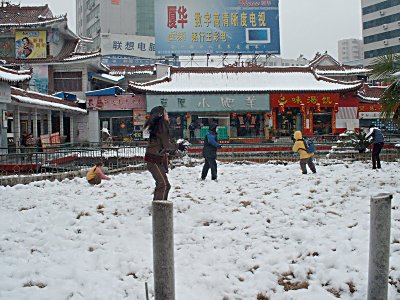 snowball fight on a park square