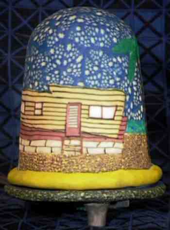 a lamp depicting a trailer home